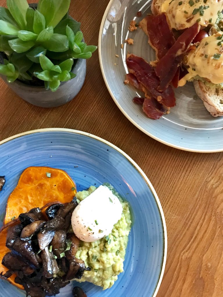 Sweet potato toast with grilled mushrooms, avocado and a poached egg, and eggs with Iberian ham from Zenith-Brunch and Cocktail Bar, Porto.