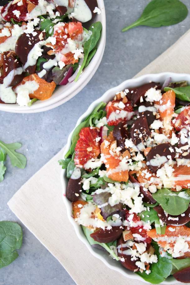 Beet feta salad with yogurt mint dressing, closeup.