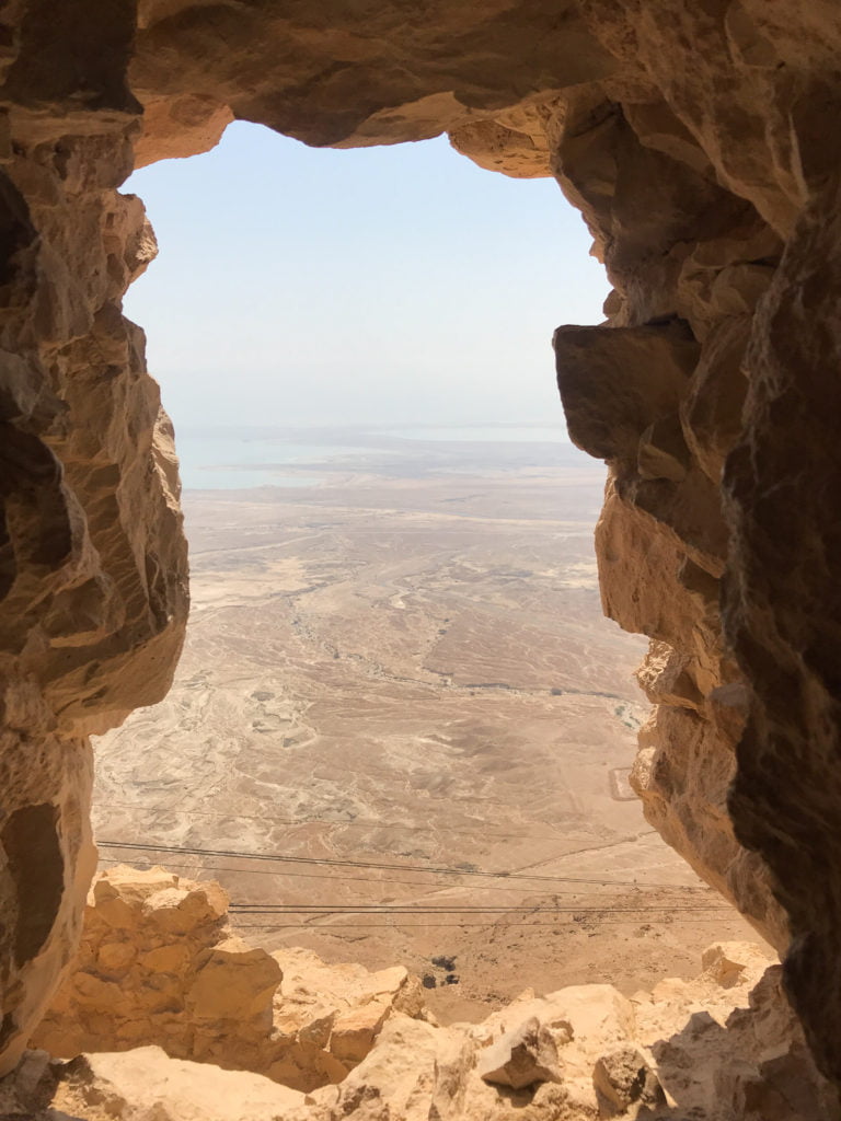 Looking over the Judean Desert and the Dead Sea in Masada: Desert landscape, red rocks for miles.