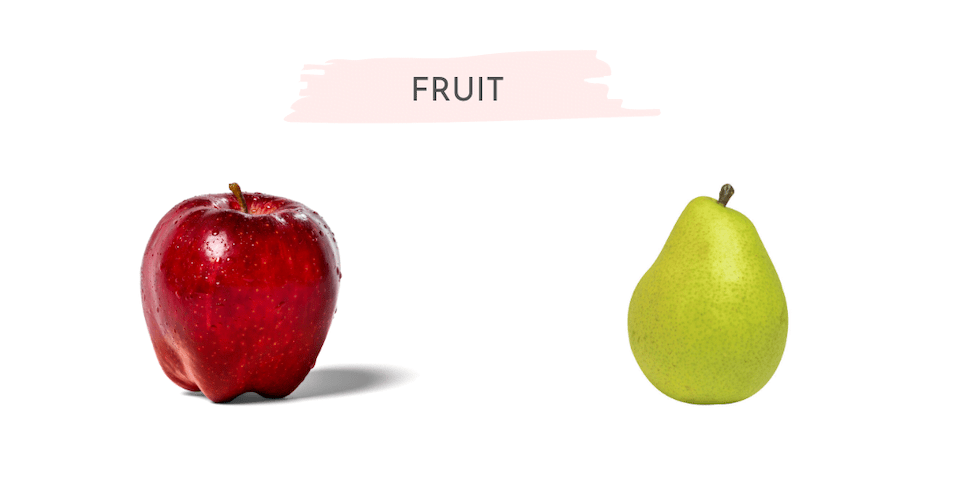 Whole apple and pear on a white background